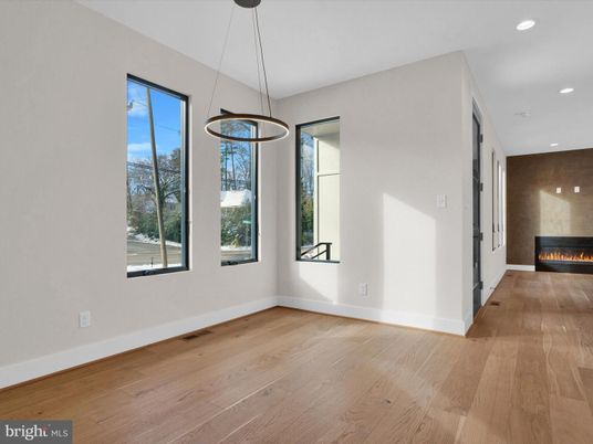 Empty room, Fireplace, Interior, Pendant Lights, Recessed Lighting, Wood Texture Flooring