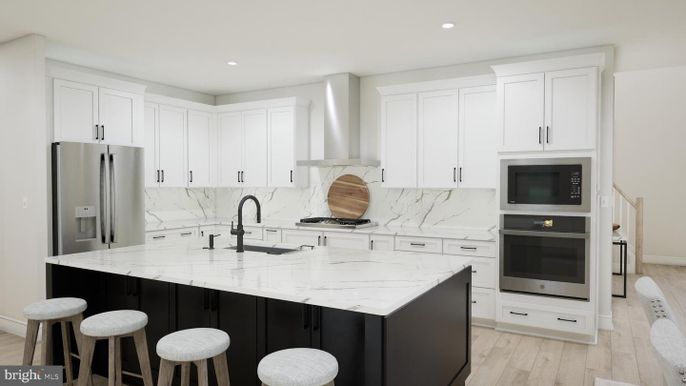 Interior, Kitchen, Marble Walls, Recessed Lighting, Stainless Steel Appliances, Wood Texture Flooring