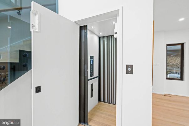 Elevator, Interior, Recessed Lighting, Wood Texture Flooring