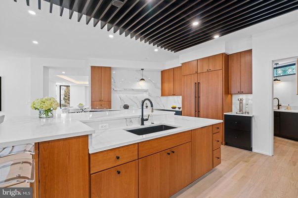 Interior, Kitchen, Marble Walls, Pendant Lights, Recessed Lighting, Wood Texture Flooring