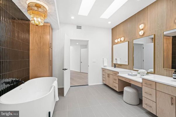 Bathroom, Chandelier, Dual Sink Vanities, Free Standing Baths, Interior, Recessed Lighting