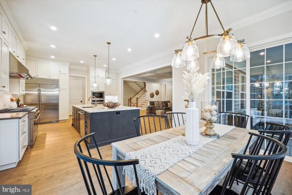 Dining room, Interior, Kitchen, Pendant Lights, Recessed Lighting, Stainless Steel Appliances, Wood Texture Flooring