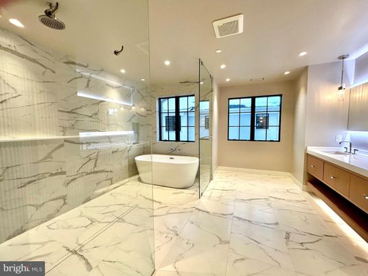 Bathroom, Dual Sink Vanities, Free Standing Baths, Glass Shower, Interior, Marble, Marble Walls, Recessed Lighting