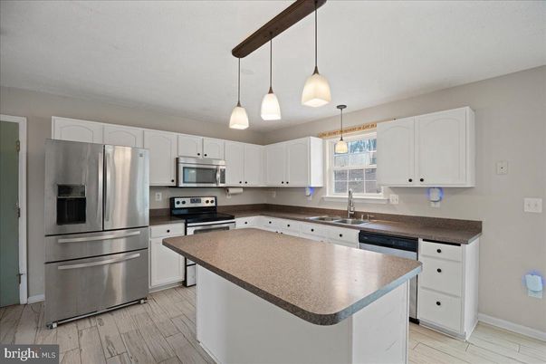 Interior, Kitchen, Pendant Lights, Stainless Steel Appliances, Wood Texture Flooring