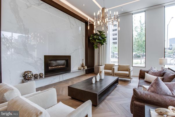 Fireplace, Interior, Living room, Marble Walls, Pendant Lights, Recessed Lighting, Wood Texture Flooring