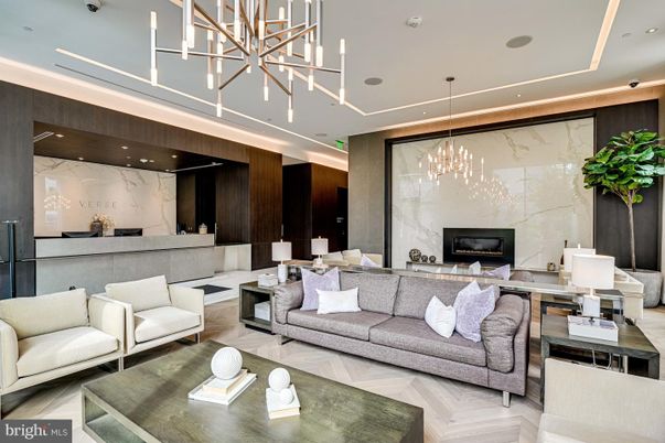 Fireplace, Interior, Living room, Marble Walls, Pendant Lights, Recessed Lighting, Wood Texture Flooring