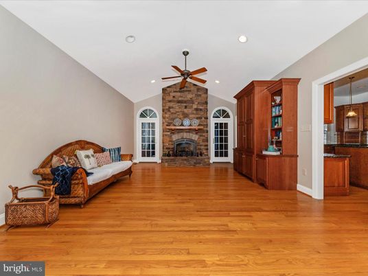 Fireplace, Interior, Living room, Pendant Lights, Recessed Lighting, Stone Walls, Wood Texture Flooring