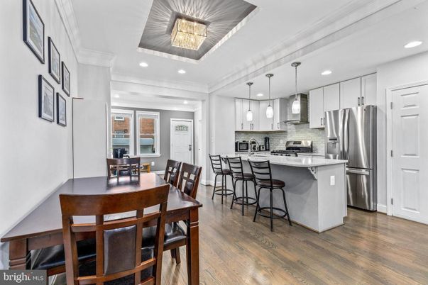 Dining room, Interior, Kitchen, Pendant Lights, Recessed Lighting, Stainless Steel Appliances, Wood Texture Flooring