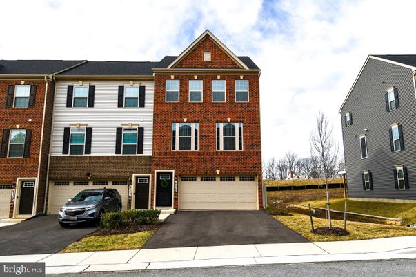 Attached, Exterior, Facade, Brick Facade, Rowhouse