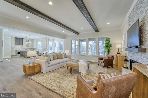 Fireplace, Interior, Kitchen, Living room, Pendant Lights, Recessed Lighting, Stainless Steel Appliances, Stone Walls, Wooden Beams, Wood Texture Flooring