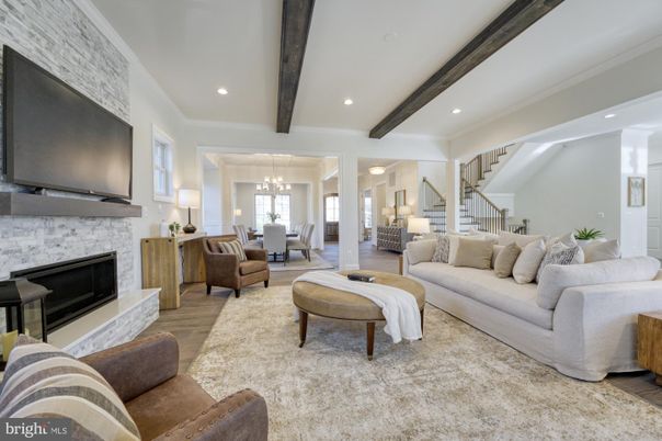 Chandelier, Dining room, Fireplace, Interior, Living room, Pendant Lights, Recessed Lighting, Wooden Beams, Wood Texture Flooring