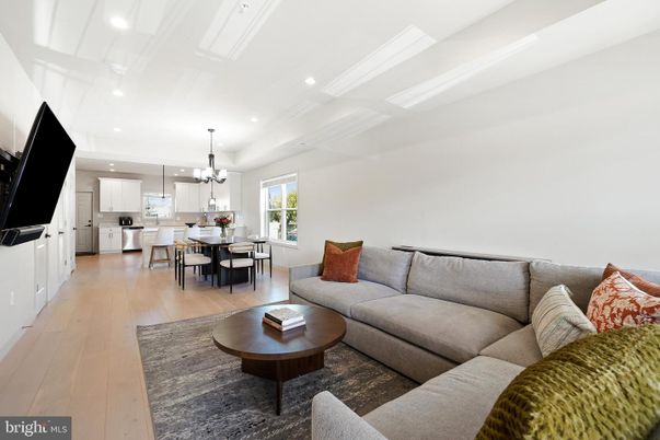 Chandelier, Dining room, Interior, Kitchen, Living room, Pendant Lights, Recessed Lighting, Stainless Steel Appliances, Wood Texture Flooring