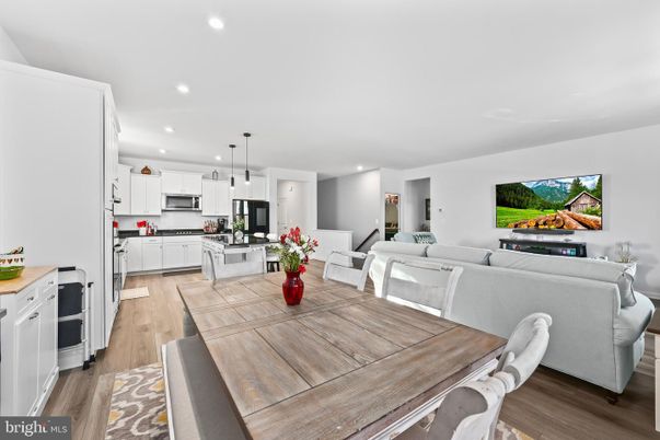 Dining room, Interior, Kitchen, Living room, Pendant Lights, Recessed Lighting, Stainless Steel Appliances, Wood Texture Flooring