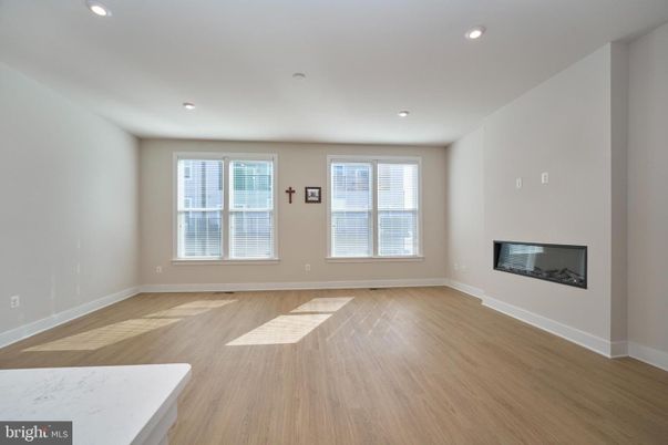 Empty room, Fireplace, Interior, Recessed Lighting, Wood Texture Flooring