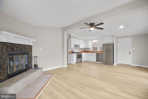 Fireplace, Interior, Kitchen, Recessed Lighting, Wood Texture Flooring