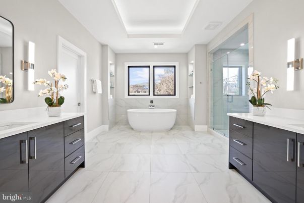 Bathroom, Dual Sink Vanities, Free Standing Baths, Glass Shower, Interior, Marble, Marble Walls, Recessed Lighting