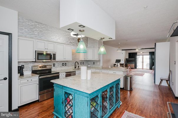 Interior, Kitchen, Pendant Lights, Stainless Steel Appliances, Wood Texture Flooring