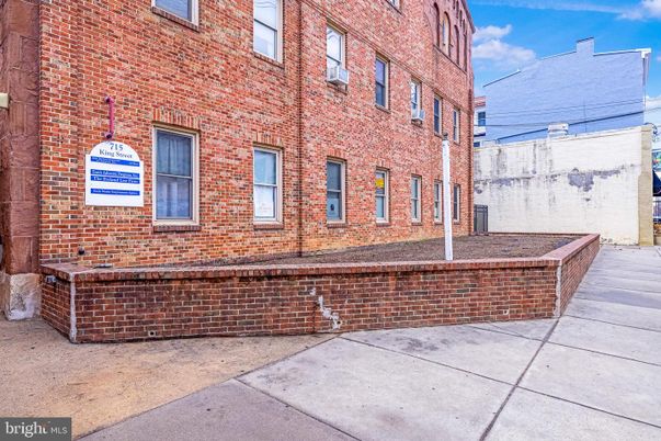Exterior, Facade, Brick Facade, Condo Building