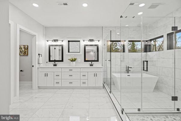 Bathroom, Dual Sink Vanities, Free Standing Baths, Glass Shower, Interior, Marble, Marble Walls, Recessed Lighting