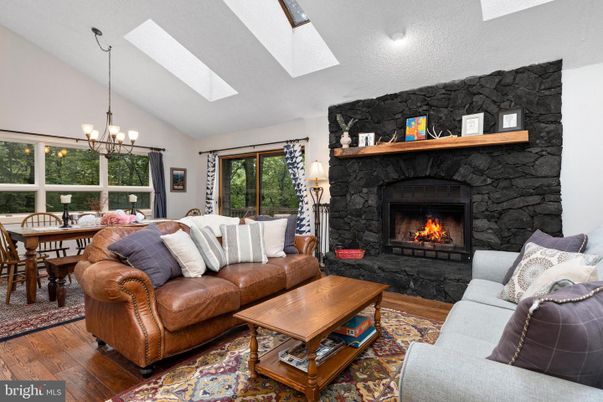 Chandelier, Dining room, Fireplace, Interior, Living room, Wood Texture Flooring