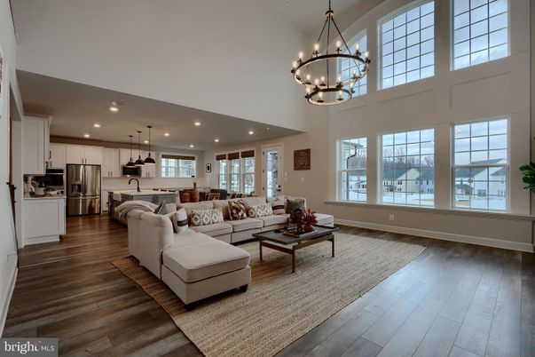 Chandelier, Interior, Kitchen, Living room, Pendant Lights, Recessed Lighting, Stainless Steel Appliances, Wood Texture Flooring