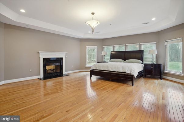 Bedroom, Fireplace, Interior, Pendant Lights, Recessed Lighting, Wood Texture Flooring