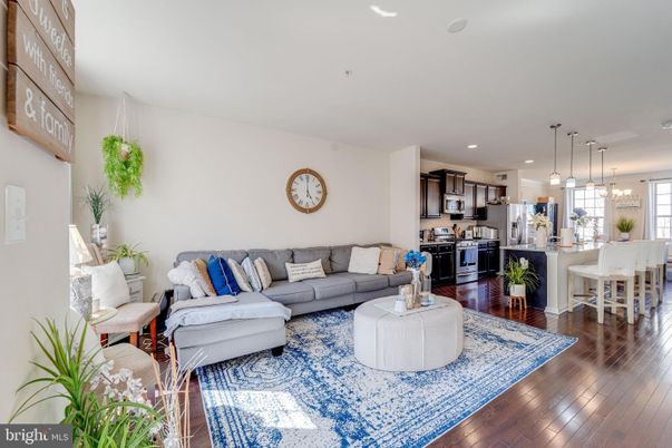 Dining room, Interior, Kitchen, Living room, Pendant Lights, Recessed Lighting, Stainless Steel Appliances, Wood Texture Flooring