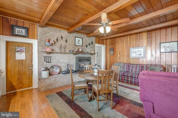 Dining room, Fireplace, Interior, Stone Walls, Wooden Beams, Wooden Ceilings, Wood Texture Flooring, Wooden Walls