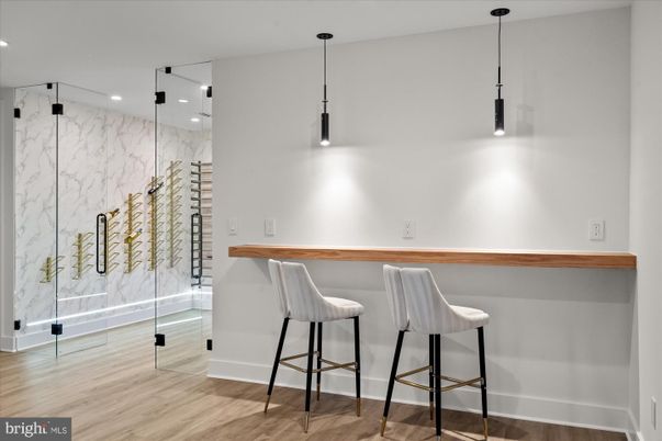 Interior, Marble Walls, Pendant Lights, Recessed Lighting, Wine Storage, Wood Texture Flooring