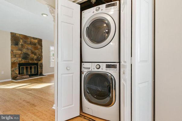 Fireplace, Interior, Stone Walls, Utility Closets, Washer, Wood Texture Flooring