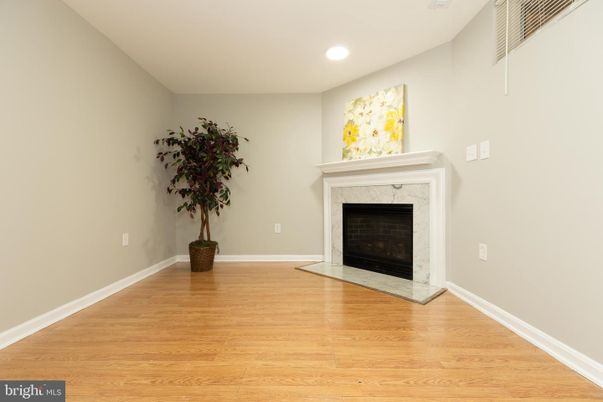 Empty room, Fireplace, Interior, Recessed Lighting, Wood Texture Flooring