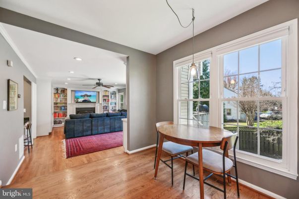 Dining room, Fireplace, Interior, Pendant Lights, Recessed Lighting, Wood Texture Flooring
