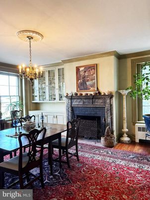 Chandelier, Dining room, Fireplace, Interior, Wood Texture Flooring