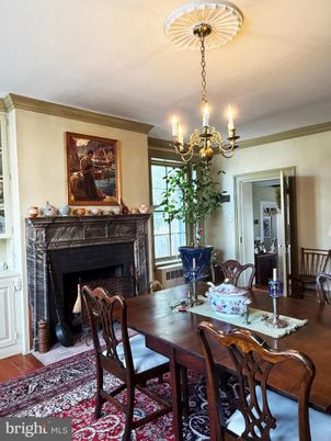 Chandelier, Dining room, Fireplace, Interior, Wood Texture Flooring