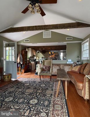 Chandelier, Interior, Kitchen, Living room, Recessed Lighting, Stainless Steel Appliances, Wooden Beams, Wood Texture Flooring
