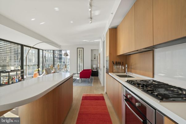Dining room, Interior, Kitchen, Living room, Recessed Lighting, Stainless Steel Appliances, Wood Texture Flooring