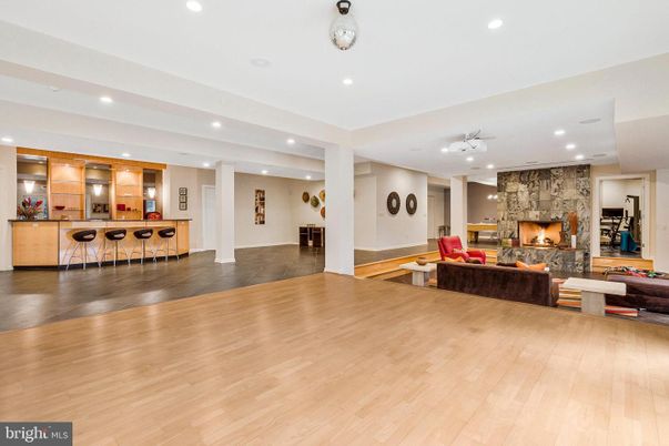 Fireplace, Interior, Kitchen, Living room, Recessed Lighting, Stone Walls, Wood Texture Flooring