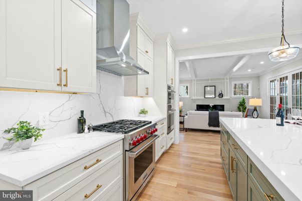 Interior, Kitchen, Living room, Marble Walls, Pendant Lights, Recessed Lighting, Stainless Steel Appliances, Wood Texture Flooring
