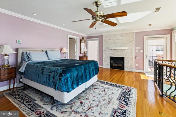 Bedroom, Fireplace, Interior, Recessed Lighting, Stone Walls, Wood Texture Flooring