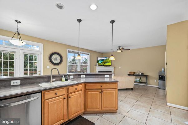 Fireplace, Interior, Kitchen, Pendant Lights, Recessed Lighting, Stainless Steel Appliances