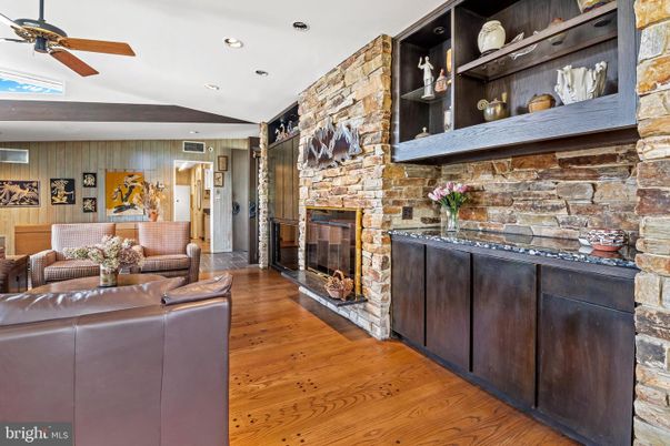 Fireplace, Interior, Recessed Lighting, Stone Walls, Wood Texture Flooring