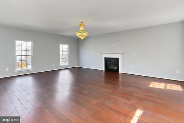 Chandelier, Empty room, Fireplace, Interior, Wood Texture Flooring