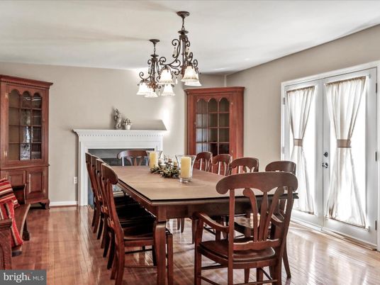 Chandelier, Dining room, Fireplace, Interior, Piano, Wood Texture Flooring