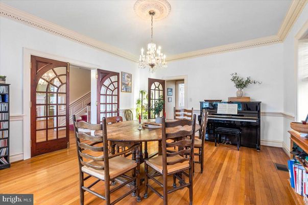 Chandelier, Dining room, Interior, Piano, Wood Texture Flooring