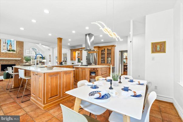 Dining room, Fireplace, Interior, Kitchen, Pendant Lights, Recessed Lighting, Stainless Steel Appliances, Stone Walls