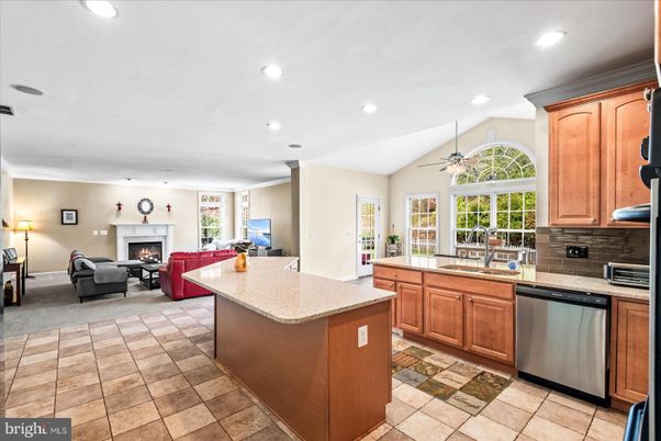Fireplace, Interior, Kitchen, Living room, Recessed Lighting, Stainless Steel Appliances