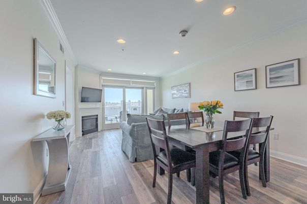 Dining room, Fireplace, Interior, Living room, Recessed Lighting, Wood Texture Flooring