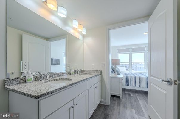 Bathroom, Bedroom, Dual Sink Vanities, Interior, Recessed Lighting, Wood Texture Flooring