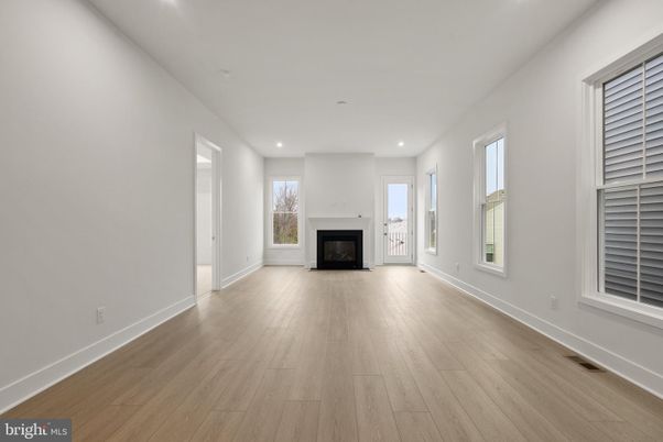 Empty room, Fireplace, Interior, Recessed Lighting, Wood Texture Flooring