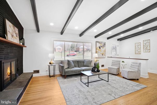 Fireplace, Interior, Living room, Recessed Lighting, Wooden Beams, Wood Texture Flooring